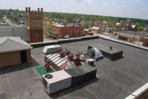 Mike Zucker enjoys the view from atop his four-story building on South Main Street Photo: James Miller/The Marion Star Source: www.marionstar.com